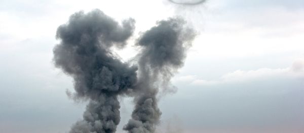 Smoke rises from the Syrian city of Kobani - Sputnik International