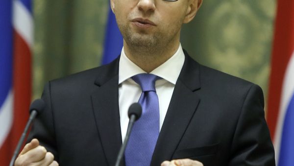 Ukrainian Prime Minister Arseniy Yatsenyuk speaks during a press conference in Kiev, Ukraine, Tuesday, Nov. 18, 2014 Ukrainian Prime Minister Arseniy Yatsenyuk speaks during a press conference in Kiev, Ukraine, Tuesday, Nov. 18, 2014 - Sputnik International