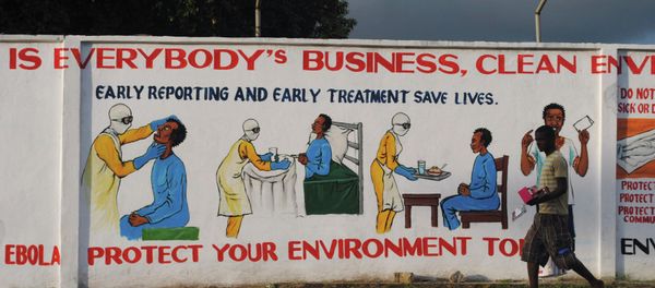 A man walks by a mural with health instructions on treating the Ebola virus, in Monrovia, November 18, 2014 A man walks by a mural with health instructions on treating the Ebola virus, in Monrovia, November 18, 2014 - Sputnik International