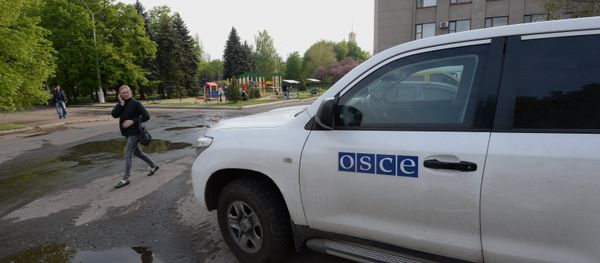 Ukrainian military forces shooting at representatives from the Organization for Security and Cooperation in Europe is “shocking” as Kiev should be providing for their safety - Sputnik International