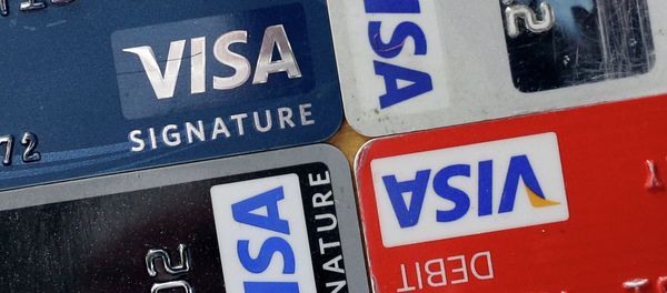 In this April 25, 2013 file photo, credit and debit cards are displayed for a photographer in Baltimore. Visa Inc. reports quarterly earnings on Thursday, April 24, 2014 In this April 25, 2013 file photo, credit and debit cards are displayed for a photographer in Baltimore. Visa Inc. reports quarterly earnings on Thursday, April 24, 2014 - Sputnik International