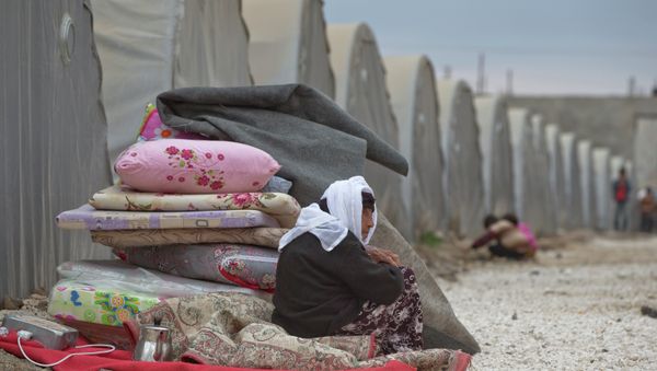 A Syrian Kurdish refugee woman - Sputnik International