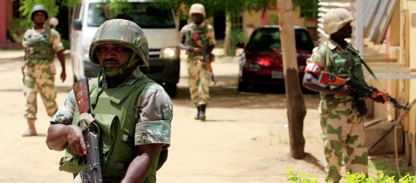 Nigerian police disrupt parliament with tear gas before crucial vote Nigerian police disrupt parliament with tear gas before crucial vote - Sputnik International