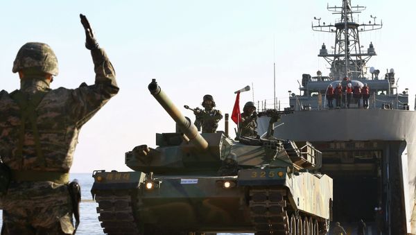 The North Korean government slammed the United States on Sunday, claiming contingency plans to shuttle American forces stationed in Japan to the Korean Peninsula in the event of war a sign of Washington's ambitions to invade the country. Photo: South Korean marines taking part in a joint US-ROK military exercise earlier this month. - Sputnik International