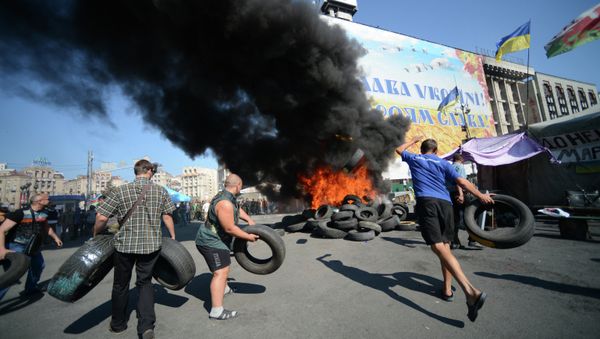 Protesters burn car tires on Independence Square (Maidan) in Kiev. Protesters burn car tires on Independence Square (Maidan) in Kiev. - Sputnik International