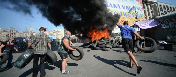 Protesters burn car tires on Independence Square (Maidan) in Kiev. Protesters burn car tires on Independence Square (Maidan) in Kiev. - Sputnik International