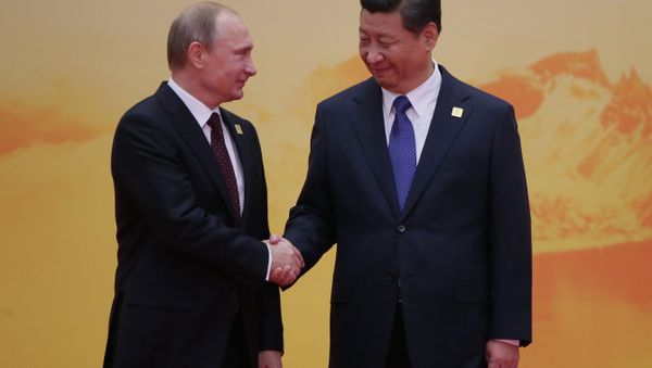 November 11, 2014. Russian President Vladimir Putin, left, and Chinese President Xi Jinping - Sputnik International
