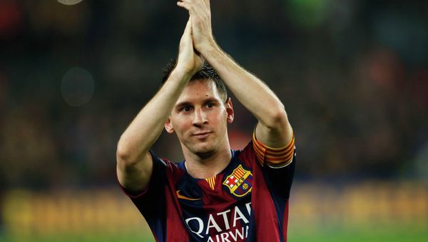 Barcelona's Lionel Messi celebrates at the end of their Spanish first division soccer match against Sevilla at Nou Camp stadium in Barcelona November 22, 2014 Barcelona's Lionel Messi celebrates at the end of their Spanish first division soccer match against Sevilla at Nou Camp stadium in Barcelona November 22, 2014 - Sputnik International
