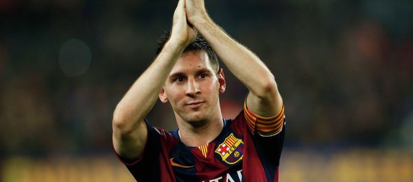Barcelona's Lionel Messi celebrates at the end of their Spanish first division soccer match against Sevilla at Nou Camp stadium in Barcelona November 22, 2014 - Sputnik International