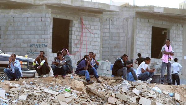 Spanish National Police has uncovered an international criminal network comprising 18 people, who illegally transferred Syrian and Iraqi citizens to Spain and other European countries. Spanish National Police has uncovered an international criminal network comprising 18 people, who illegally transferred Syrian and Iraqi citizens to Spain and other European countries. - Sputnik International