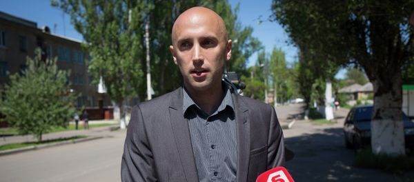British journalist Graham Phillips, who has worked for a Russian TV-channel, was wounded by a shell fragment on Monday and is currently in a Donetsk hospital. - Sputnik International