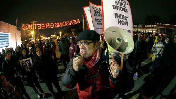 Protesters gather in front of the Ferguson Police Department before the announcement of the grand jury decision about whether to indict a Ferguson police officer in the shooting death of Michael Brown in Ferguson Protesters gather in front of the Ferguson Police Department before the announcement of the grand jury decision about whether to indict a Ferguson police officer in the shooting death of Michael Brown in Ferguson - Sputnik International