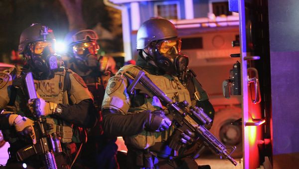 The United States pursues a policy of double standards in dispersing demonstrations in the city of Ferguson, Missouri, a senior Russian parliamentarian told RIA Novosti Wednesday. The United States pursues a policy of double standards in dispersing demonstrations in the city of Ferguson, Missouri, a senior Russian parliamentarian told RIA Novosti Wednesday. - Sputnik International