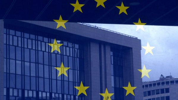 European Council building is reflected in a photograph of the EU flag on the wall of the European Council building, in Brussels European Council building is reflected in a photograph of the EU flag on the wall of the European Council building, in Brussels - Sputnik International