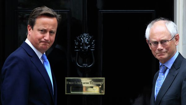 Britain's Prime Minister David Cameron, left, poses for members of the media with Herman van Rompuy, right Britain's Prime Minister David Cameron, left, poses for members of the media with Herman van Rompuy, right - Sputnik International