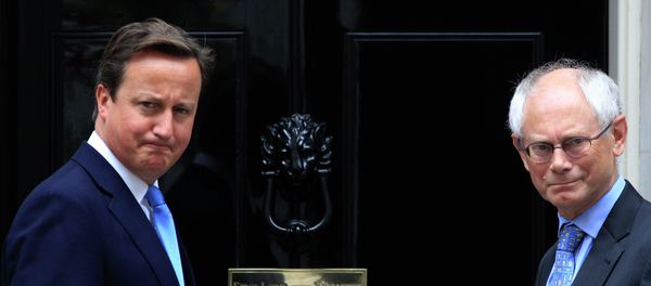 Britain's Prime Minister David Cameron, left, poses for members of the media with Herman van Rompuy, right Britain's Prime Minister David Cameron, left, poses for members of the media with Herman van Rompuy, right - Sputnik International