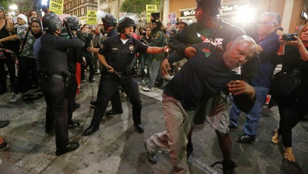 Making policemen wear body-mounted cameras and recording interactions with the public will not change the behavior of a force that is ultimately racist Making policemen wear body-mounted cameras and recording interactions with the public will not change the behavior of a force that is ultimately racist - Sputnik International