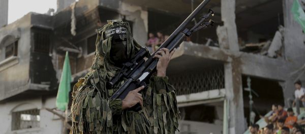 A Palestinian militant of Izzedine al-Qassam Brigades, military wing of Hamas - Sputnik International