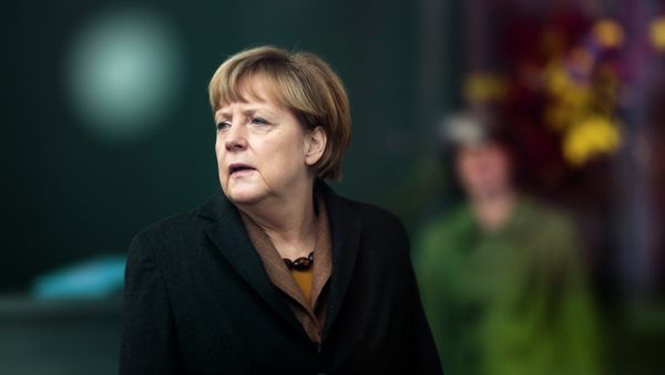German Chancellor Angela Merkel waits for the arrival of Pakistani Prime Minister Nawaz Sharif for talks at the chancellery in Berlin, Tuesday, Nov. 11, 2014 - Sputnik International