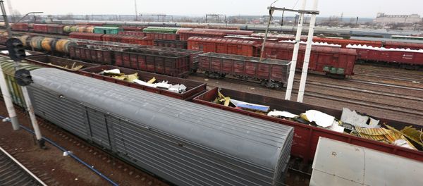 Freight train carrying wreckage pieces of Malaysia Airlines Boeing in Kharkiv region - Sputnik International