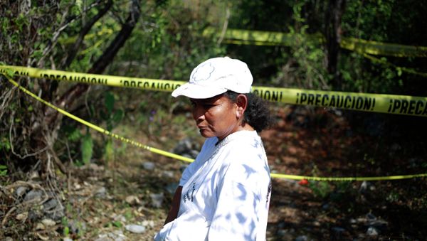 A woman with missing relatives in Mexico. - Sputnik International