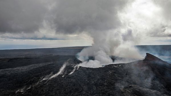 Smoke rises from the Pu'u O'o vent on the Kilauea Volcano October 29, 2014 on the Big Island of Hawaii Smoke rises from the Pu'u O'o vent on the Kilauea Volcano October 29, 2014 on the Big Island of Hawaii - Sputnik International