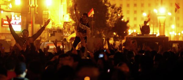 Anti-Mubarak protesters shout slogans against government and military rules after the verdict of former Egyptian President Hosni Mubarak's trial, around Abdel Moneim Riad square in downtown Cairo November 29, 2014 Anti-Mubarak protesters shout slogans against government and military rules after the verdict of former Egyptian President Hosni Mubarak's trial, around Abdel Moneim Riad square in downtown Cairo November 29, 2014 - Sputnik International