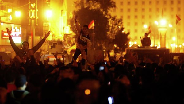 Anti-Mubarak protesters shout slogans against government and military rules after the verdict of former Egyptian President Hosni Mubarak's trial, around Abdel Moneim Riad square in downtown Cairo November 29, 2014 Anti-Mubarak protesters shout slogans against government and military rules after the verdict of former Egyptian President Hosni Mubarak's trial, around Abdel Moneim Riad square in downtown Cairo November 29, 2014 - Sputnik International
