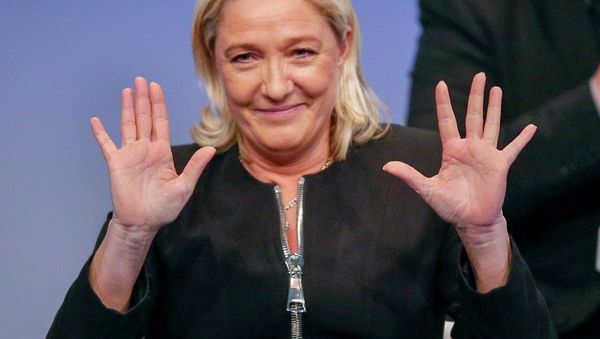 Marine Le Pen, France's National Front political party leader, gestures as she attends the French far-right party's congress in Lyon November 29, 2014 Marine Le Pen, France's National Front political party leader, gestures as she attends the French far-right party's congress in Lyon November 29, 2014 - Sputnik International