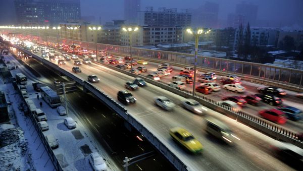 Cars drive along a bridge after snowfall in Urumqi, Xinjiang Autonomous region, November 28, 2014 Cars drive along a bridge after snowfall in Urumqi, Xinjiang Autonomous region, November 28, 2014 - Sputnik International
