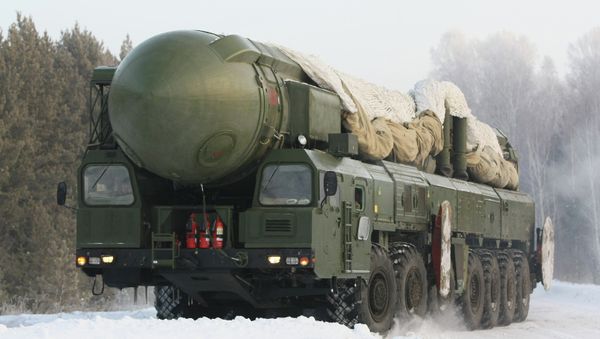 The RT-2PM Topol ballistic missile riding to the site of its permanent deployment with the Strategic Missile Forces of the Central Military Distric - Sputnik International