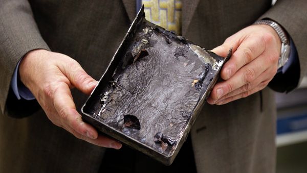 Fire-damaged battery casing from the Japan Airlines Boeing 787 Dreamliner that caught fire at Logan International Airport in Boston - Sputnik International