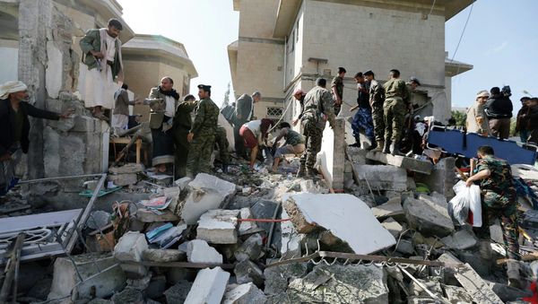 Police troopers gather at the damaged residence of the Iranian ambassador after a car bomb attack in Sanaa December 3, 2014 Police troopers gather at the damaged residence of the Iranian ambassador after a car bomb attack in Sanaa December 3, 2014 - Sputnik International