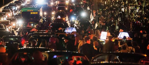 Protesters, demanding justice for the death of Eric Garner, disrupt traffic along the West Side Highway in Manhattan, New York on December 3, 2014. - Sputnik International