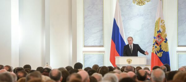 Russian President Vladimir Putin delivers the annual Presidential Address to the Federal Assembly at the Kremlin's St. George's Hall. Russian President Vladimir Putin delivers the annual Presidential Address to the Federal Assembly at the Kremlin's St. George's Hall. - Sputnik International