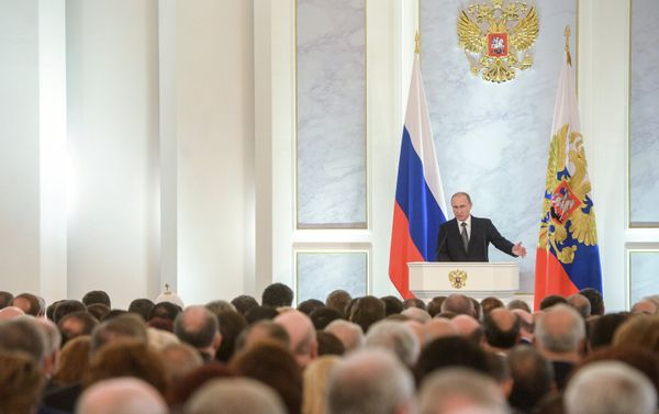 Russian President Vladimir Putin delivers the annual Presidential Address to the Federal Assembly at the Kremlin's St. George's Hall. Russian President Vladimir Putin delivers the annual Presidential Address to the Federal Assembly at the Kremlin's St. George's Hall. - Sputnik International