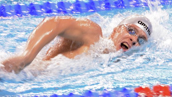 Russian swimmers set a new world record in the men’s 4x50m medley relay Russian swimmers set a new world record in the men’s 4x50m medley relay - Sputnik International