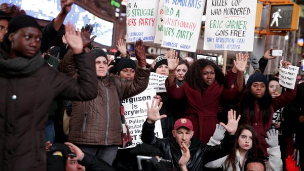 People participate in a protest in response to the grand jury's decision in the Eric Garner case in Times Square in New York - Sputnik International