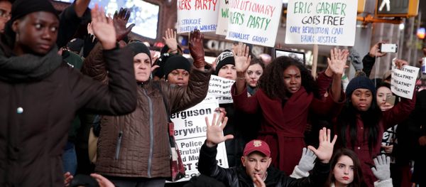 People participate in a protest in response to the grand jury's decision in the Eric Garner case in Times Square in New York People participate in a protest in response to the grand jury's decision in the Eric Garner case in Times Square in New York - Sputnik International