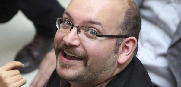 Jason Rezaian, an Iranian-American correspondent for the Washington Post smiles as he attends a presidential campaign of President Hassan Rouhani in Tehran, Iran. (File) - Sputnik International