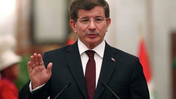 Turkey's Prime Minister Ahmet Davutoglu speaks at a news conference with Iraqi Prime Minister Haider al-Abadi (not pictured) in Baghdad, November 20, 2014 Turkey's Prime Minister Ahmet Davutoglu speaks at a news conference with Iraqi Prime Minister Haider al-Abadi (not pictured) in Baghdad, November 20, 2014 - Sputnik International