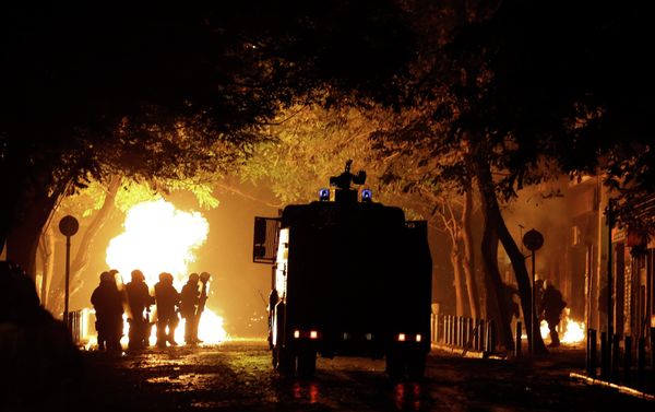 A police water cannon operates as riot police try to avoid petrol bombs during a protest in the Athens neighborhood of Exarchia, with a reputation of being a haven for extreme leftists and anarchists, on Saturday, Dec. 6, 2014 A police water cannon operates as riot police try to avoid petrol bombs during a protest in the Athens neighborhood of Exarchia, with a reputation of being a haven for extreme leftists and anarchists, on Saturday, Dec. 6, 2014 - Sputnik International