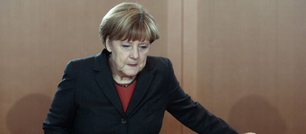 German Chancellor Angela Merkel arrives for the cabinet meeting in Berlin, Germany, Wednesday, Dec. 3, 2014 - Sputnik International