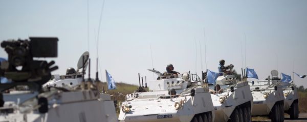 Armored vehicles from the UN peacekeepers of the United Nations Disengagement Observer Force, also known as UNDOF wait to cross from the Israeli controlled Golan Heights to Syria. Armored vehicles from the UN peacekeepers of the United Nations Disengagement Observer Force, also known as UNDOF wait to cross from the Israeli controlled Golan Heights to Syria. - Sputnik International