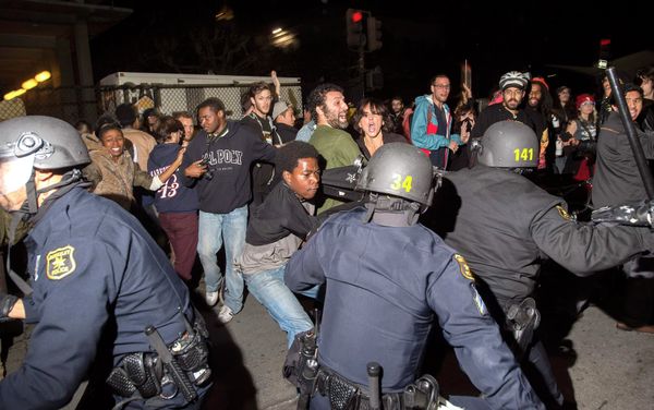 Police officers scuffle with protesters during a protest against police violence in the U.S., in Berkeley, California. More than five police vehicles suffered damage as several hundred protesters took to the streets before being dispersed with teargas. Police officers scuffle with protesters during a protest against police violence in the U.S., in Berkeley, California. More than five police vehicles suffered damage as several hundred protesters took to the streets before being dispersed with teargas. - Sputnik International
