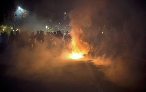 Police officers deploy teargas while trying to disperse a crowd comprised largely of student protesters during a protest against police violence in the U.S., in Berkeley, California early December 7, 2014. Police officers deploy teargas while trying to disperse a crowd comprised largely of student protesters during a protest against police violence in the U.S., in Berkeley, California early December 7, 2014. - Sputnik International