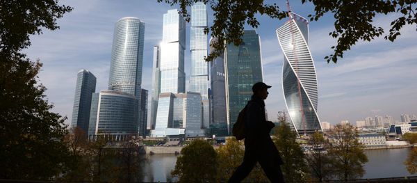 A passer-by near the Moscow International Business Center Moscow-City in Moscow A passer-by near the Moscow International Business Center Moscow-City in Moscow - Sputnik International