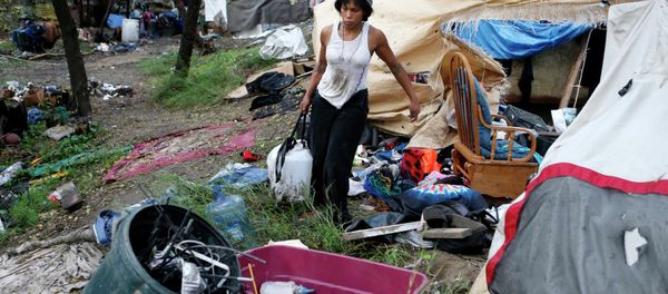 A homeless encampment occupant A homeless encampment occupant - Sputnik International