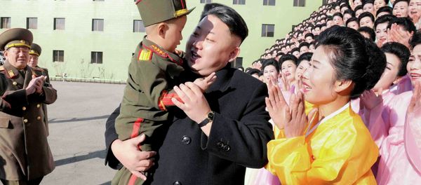 North Korean leader Kim Jong Un holds a boy after a photo session with participants in the Second Meeting of KPA Exemplary Servicemen's Families in this undated photo released by North Korea's Korean Central News Agency (KCNA) in Pyongyang North Korean leader Kim Jong Un holds a boy after a photo session with participants in the Second Meeting of KPA Exemplary Servicemen's Families in this undated photo released by North Korea's Korean Central News Agency (KCNA) in Pyongyang - Sputnik International