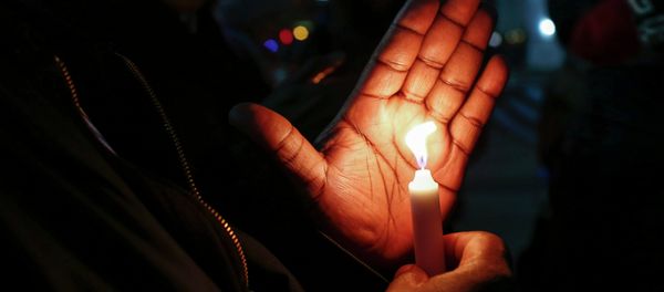 People hold candles while they take part in a rally to call for action in response to police violence, at the steps of City Hall in New York, December 12, 2014 People hold candles while they take part in a rally to call for action in response to police violence, at the steps of City Hall in New York, December 12, 2014 - Sputnik International